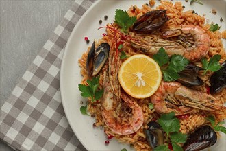 Seafood paella, shrimp and mussels risotto, rice, homemade, top view, no people