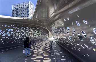 The Parkbruk, cycle and pedestrian bridge in the city centre of Antwerp, crosses a multi-lane city