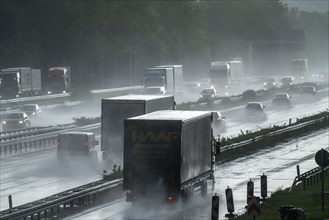 A2 motorway, at Recklinghausen motorway junction, heavy traffic during a thunderstorm, North