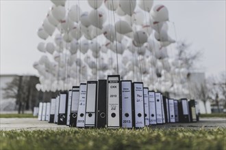 File folders stand in front of the Federal Chancellery as part of a protest action by the German