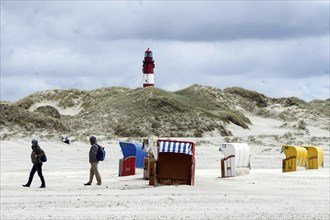 Lighthouse on the island of Amrum, beach chairs on the sandy beach, 27.05.2021