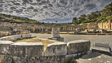 HDR, Super wide angle, View of an ancient exedra, under a cloudy sky, Kamiros, Archaeological site,