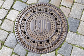 Historical manhole cover with the city Coat of Arms, Dresden, Saxony, Germany, Europe