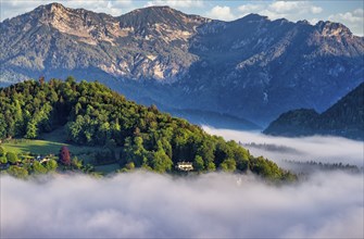 Morning fog over the village of Berchtesgaden in the valley, Berchtesgaden National Park, Upper