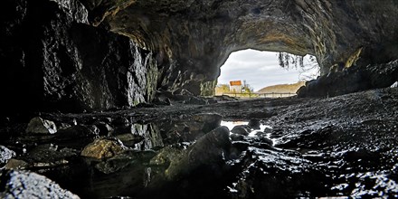 View from the Feldhof Cave in the Hönne Valley in Balve to Klusenstein Castle in Hemer, MÃ¤rkisches