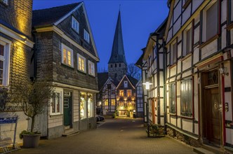 The old town of Hattingen, JohannisstraÃŸe, St. George's Church, leaning church tower,