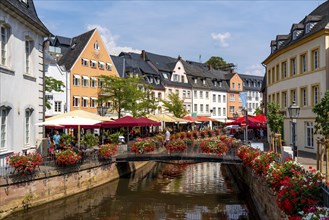 The town of Saarburg, on the Saar, at the market, gastronomy on the Leuk stream, flows into the