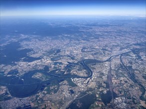 Aerial view from a great height View of the mouth of the Neckar flowing into the Rhine on the right