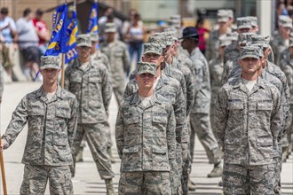 Flights of airmen at parade rest during United States Air Force basic training graduation