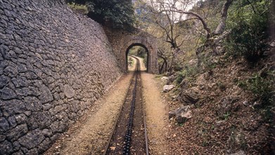 Section of the narrow-gauge railway to Kalavrita, small tunnel, stone wall, Kalavrita, Peloponnese,