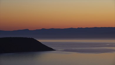 Gentle gradient in the sky over a calm sea at dusk, sunrise, Mani Peninsula, Peloponnese, Greece,