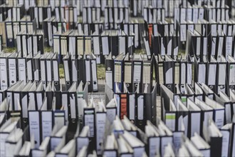 File folders stand in front of the Federal Chancellery as part of a protest action by the German