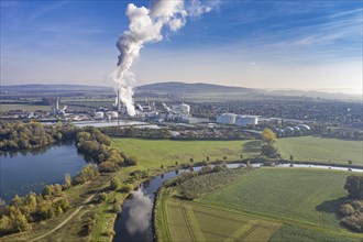 Drone shot of river Leine with Nordzucker sugar factory in Nordstemmen, smoking chimneys on a cold