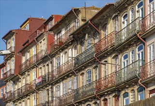 Colorful facades of houses along Cais da Estiva in the Ribeira district, Porto, Portugal, Europe