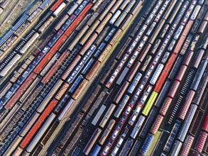 Deutsche Bahn AG marshalling yard. Many goods trains are parked on the tracks with tank wagons, car