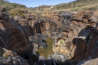 Canyon with steep orange-coloured cliffs with the Blyde River, Bourke's Luck Potholes, Panorama