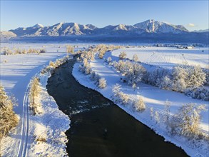 Aerial view of a river in front of mountains, evening light, snow, winter, Loisach, Alpine