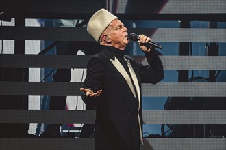 Neil Tennant, singer of the Pet Shop Boys live on Dreamworld: The Greatest Hits Live Tour at the