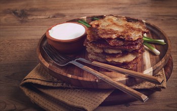 Potato pancakes, pancakes with sour cream, Belarusian dish, homemade, no people