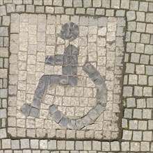 Sonderborg, Als, city of Sonderborg, symbol disabled person, person in wheelchair, paving stones,