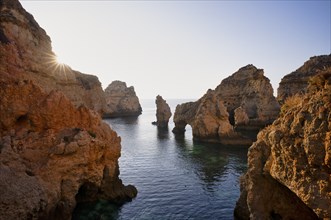 Coloured cliffs and sunrise, rocks in the sea, Ponta da Piedade, Lagos, caves, cliffs, Atlantic