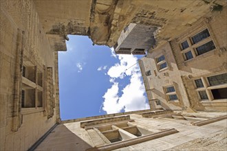 Houses and courtyard with view upwards, Mairie town hall, mountain village, Les Baux-de-Provence,