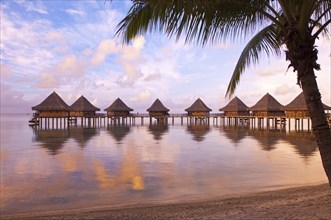 French Polynesia, Hua Hin, Rangiroa. Sunset, Kia Ora Resort, Rangiroa, Oceania