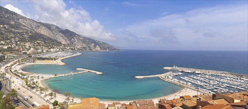 Scenic panoramic view of Menton seashore promenade and historic city in French Riviera Cote D azur