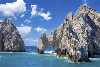 Mexico, Los Cabos, boat tours to tourist destination Arch of Cabo San Lucas, El Arco and beaches,