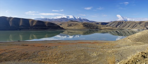 Mountains reflecting in Van Lake, Van, Turkey, Asia