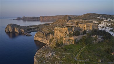 Drone shot, first morning light, Lindos, Acropolis of Lindos, View of an ancient fortress on the