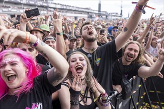 Adenau, Germany, 8 June 2024: Fans listen to Electric Callboy at Rock am Ring. The festival takes