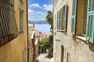 France, French Riviera, Villefranche old city streets in historic city center near sea promenade,