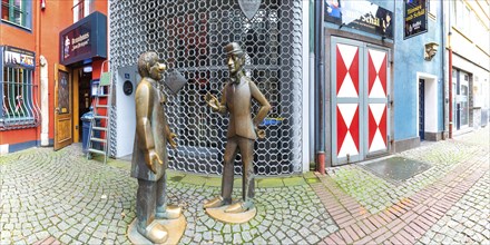 Monument to Tünnes and SchÃ¤l, two legendary characters from the HÃ¤nneschen puppet theatre in