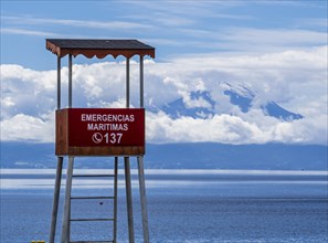 Watch tower of lifeguards, village Frutilliar at lake Lago Llanquihue, volcano Osorno covered by