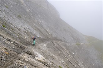 Hiker in the fog, Alpine dangers, Carnic Main Ridge, Carnic High Trail, Carnic Alps, Carinthia,