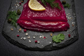 Salmon gravlax with beetroot, Scandinavian snack, beet gravlax, lightly salted fish, homemade, no