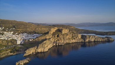 Drone shot, first morning light, Lindos, Acropolis of Lindos, panoramic view of a fortress on