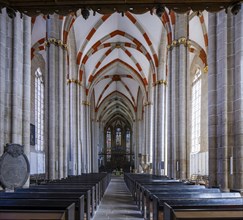 The Divi Blasii Church is a three-nave, cruciform hall church on the Untermarkt square in the town