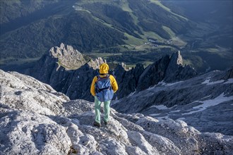 Hiker Looking down into the valley from the Hochkönig, Salzburger Land, Austria, Europe