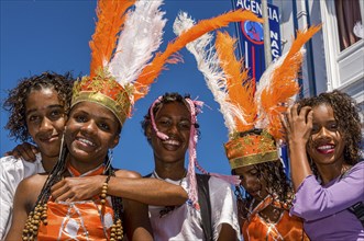 Costumed people celebrating Carnival. Mindelo. Cabo Verde. Africa