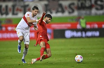 Tackle, foul by Atakan Karazor VfB Stuttgart (16) on Eren Dinkci 1. FC Heidenheim 1846 FCH (08),