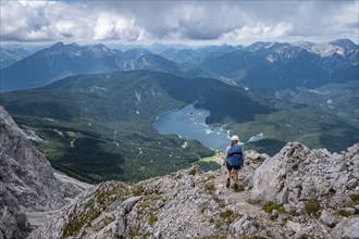 Mountaineer at Waxenstein, Eibsee lake, Wetterstein Mountains, Garmisch-Patenkirchen, Bavaria,