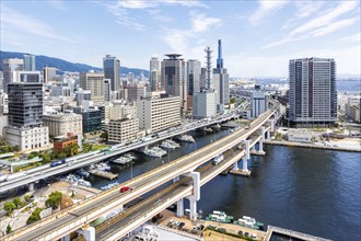 Kobe skyline from above with harbour and elevated roads in Kobe, Japan, Asia