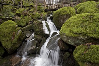 Moss-covered rocks, waterfalls, wooden bridge, Geishöll waterfalls, In der Geishöll, near