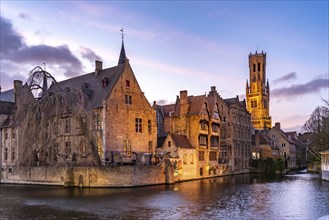 Rozenhoedkaai canal with belfry at dusk, Bruges, Belgium, Europe