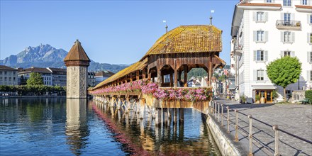 Lucerne city on the river Reuss with Chapel Bridge and Mount Pilatus panorama in Lucerne,