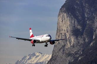 Aircraft of the airline Austrian Airlines, Airbus A319-100, approaching Innsbruck Kranebitten