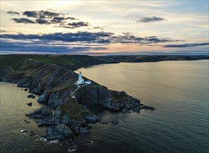 Sunset over Start Point Lighthouse from a drone, Trinity House and South West Coast Path, Devon,