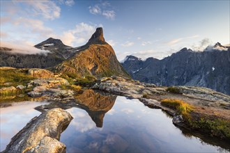 Romsdalshornet mountain reflected in mountain lake, Ã…ndalsnes, More og Romsdal, Norway, Europe